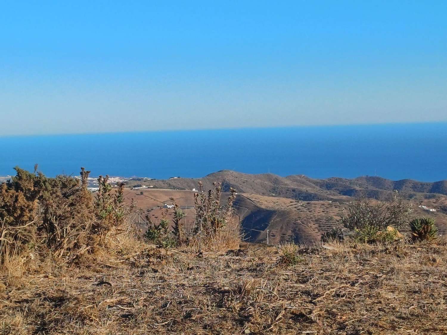 Terreno edificabile a Moclinejo con vista mare