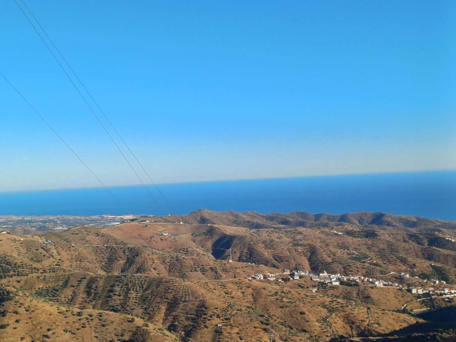 Terrain à Moclinejo avec vue sur mer