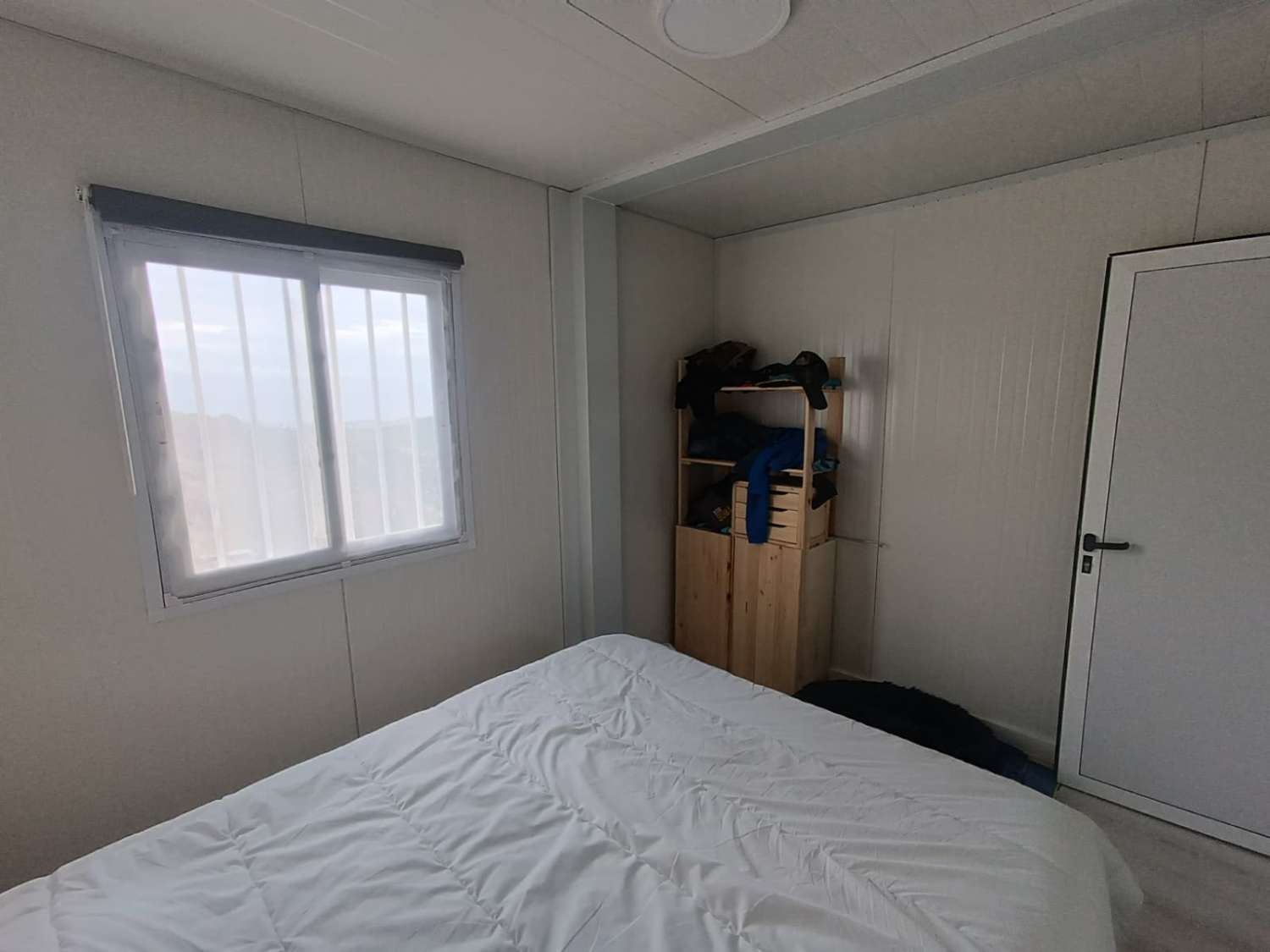 Parcela con casa  prefabricada en moclinejo