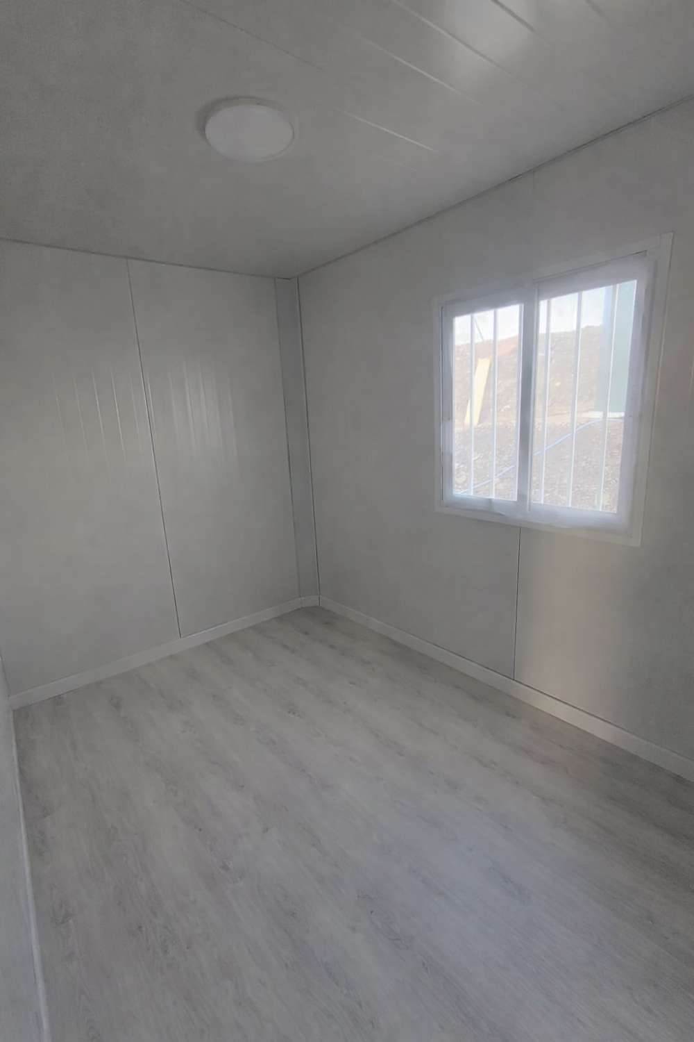 Parcela con casa  prefabricada en moclinejo