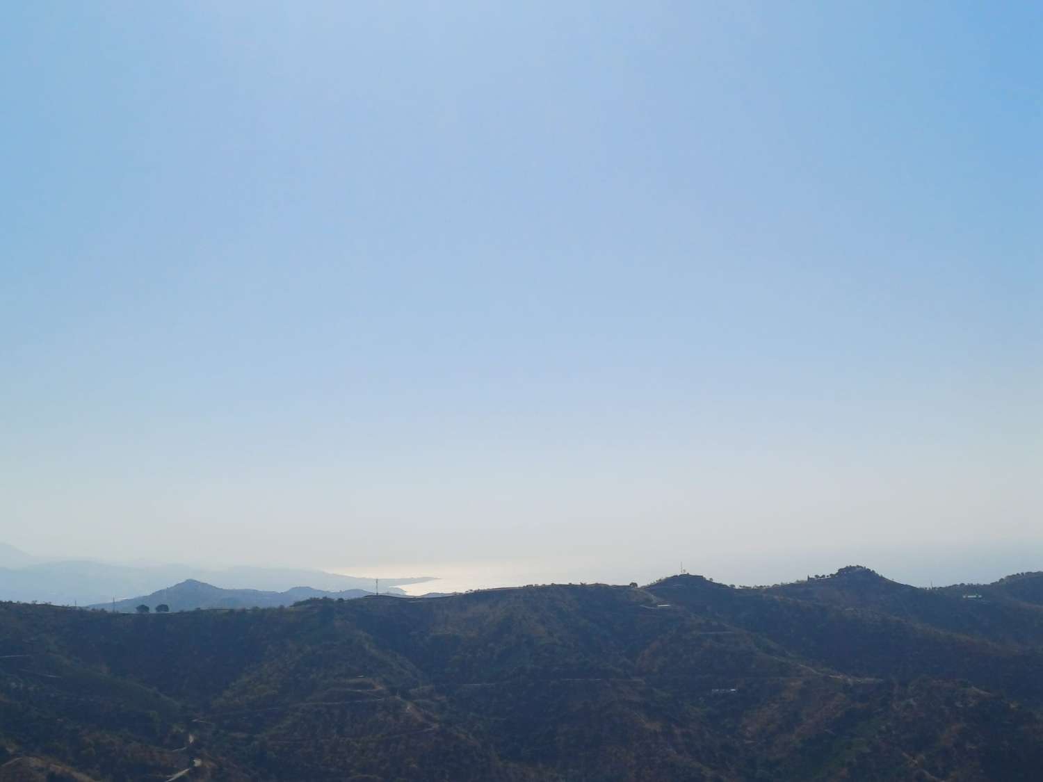Rustic plot in Moclinejo with sea views